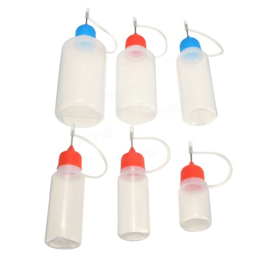 Bottle (empty), volume 10 ml., with a metal needle Bottle (empty), volume 10 ml., with a metal needle